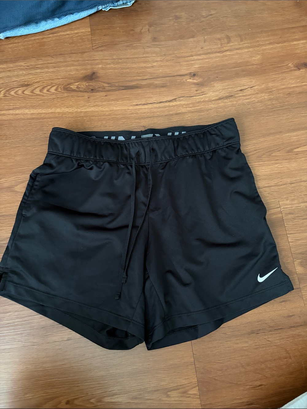 Nike Black Women's Athletic Shorts with White Swoosh